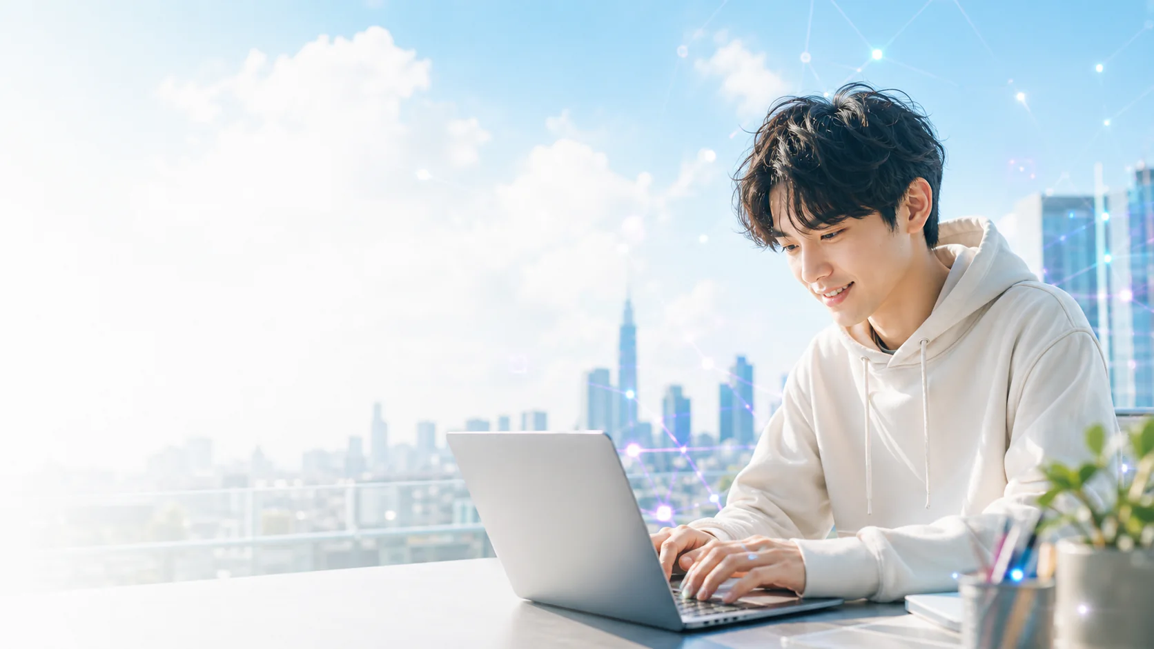 明るい都市を背景に、ノートパソコンで自分のソフトを作る若いストリートエンジニア